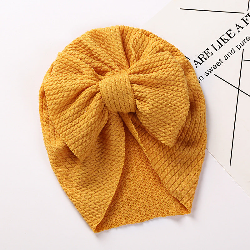 Cozy Pit-Strip Baby Beanie with Bows