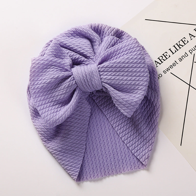 Cozy Pit-Strip Baby Beanie with Bows