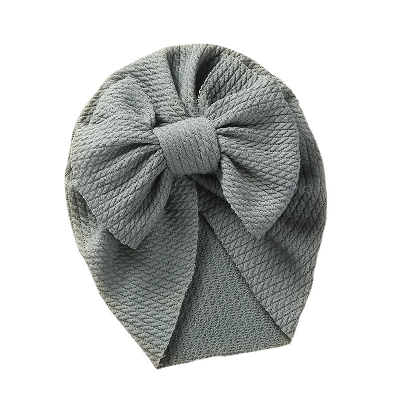 Cozy Pit-Strip Baby Beanie with Bows