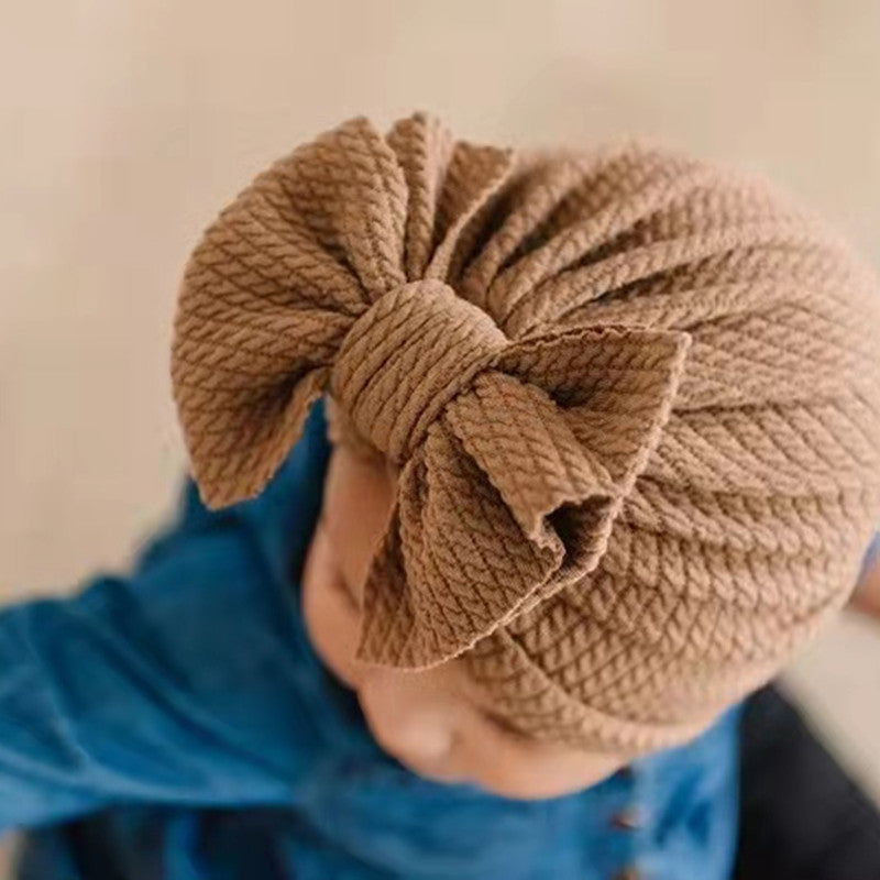 Cozy Pit-Strip Baby Beanie with Bows