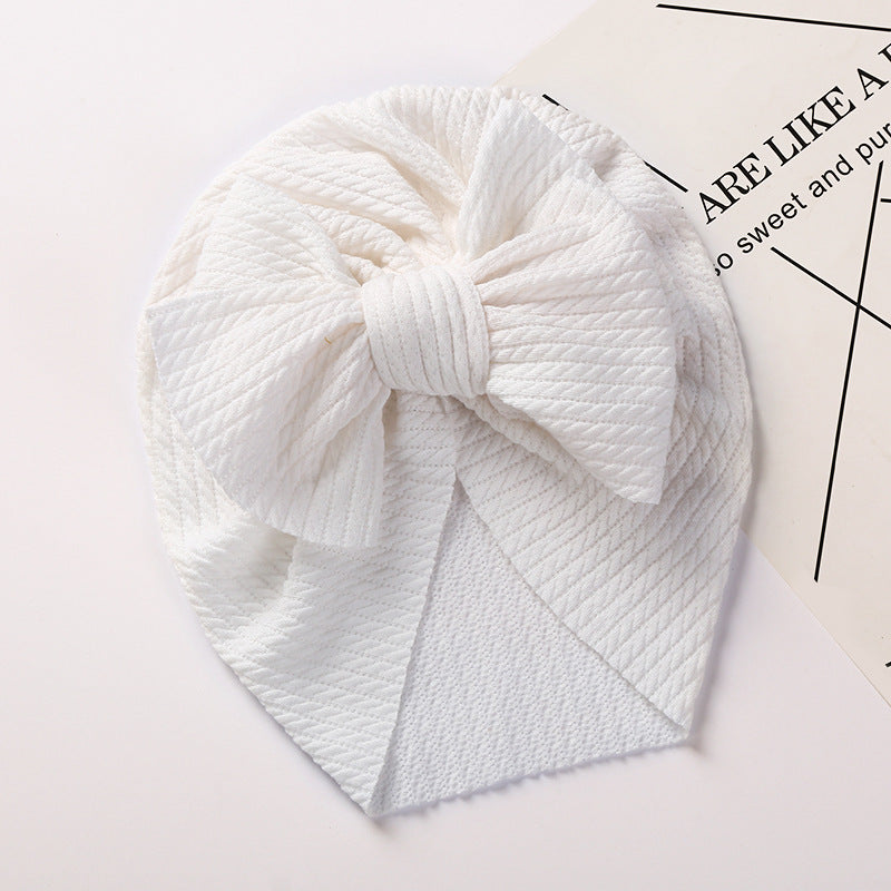 Cozy Pit-Strip Baby Beanie with Bows