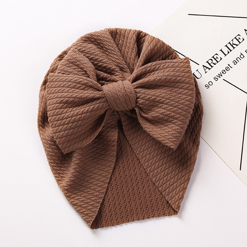 Cozy Pit-Strip Baby Beanie with Bows