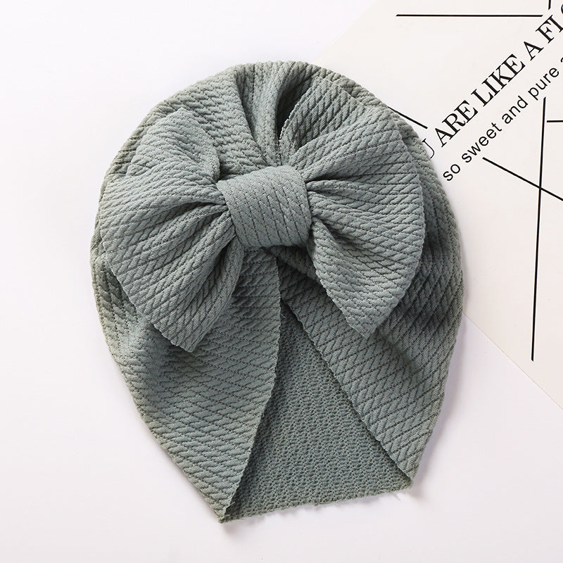 Cozy Pit-Strip Baby Beanie with Bows