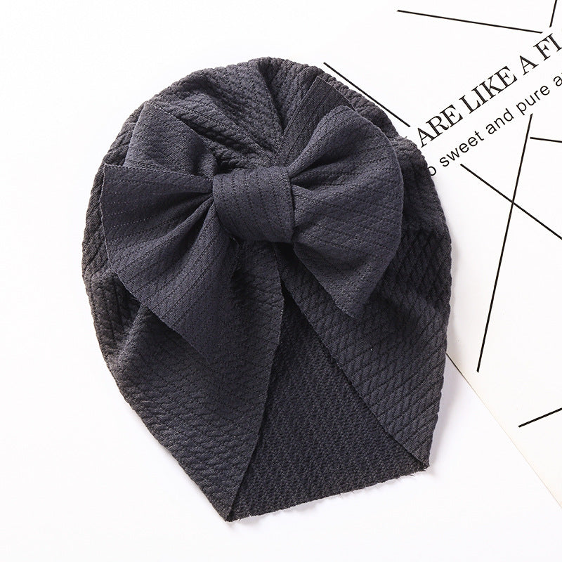 Cozy Pit-Strip Baby Beanie with Bows